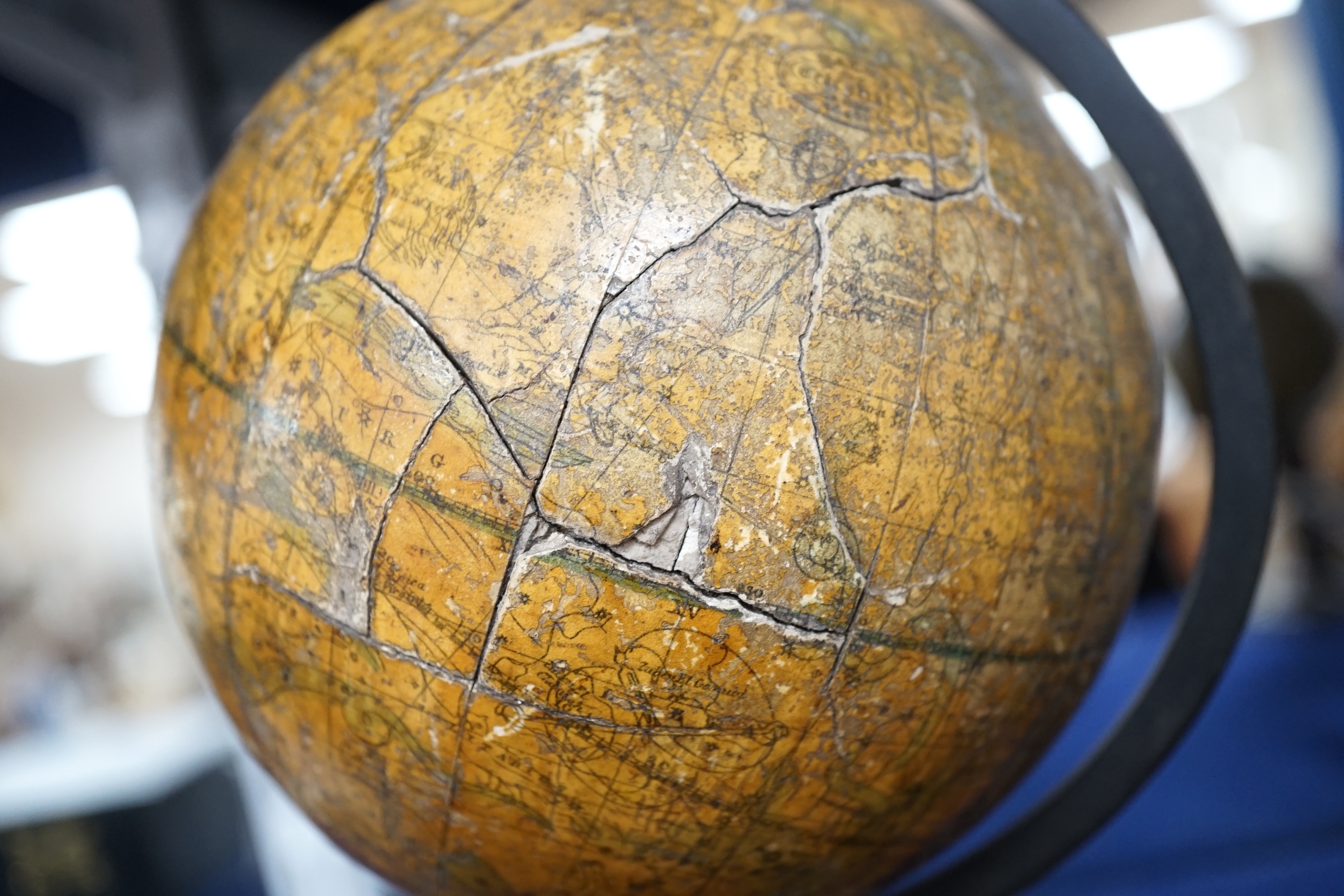 A 19th century 4.5 inch celestial globe on mahogany stand, with distinct maker’s mark reading; ‘Bales? New Celestial Globe 1846’, diameter 11cm. Condition poor, significant damage to the surface and missing sections of p